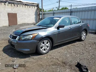 2009 Honda Accord LX-P with VIN 1HGCP26409A050548, listed as a Copart auction lot 66110115 with 132,742 mi miles and Salvage title. Bid and sale history available at DreamBid. Image 1.