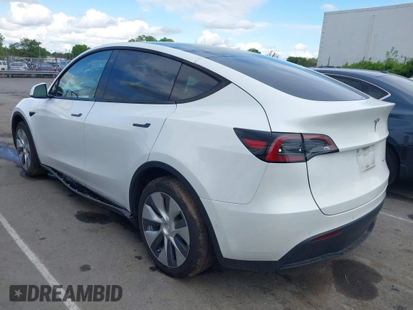 2022 Tesla Model Y Long Range z VIN 7SAYGDEE6NF419332, wystawiony jako IAAI lot #42020974 z przebiegiem 55 680 mil mil oraz . Historia ofert i sprzedaży dostępna na DreamBid. Obrazek 3.