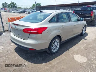 2016 Ford Focus SE with VIN 1FADP3F24GL365819, listed as a IAAI auction lot 42549249 with 94,550 mi miles and . Bid and sale history available at DreamBid. Image 4.