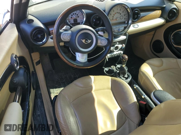 2008 MINI Hardtop with VIN WMWMF33508TT66699, listed as a Copart auction lot 48233985 with 88,817 mi miles and Salvage Title. Bid and sale history available at DreamBid. Image 8.