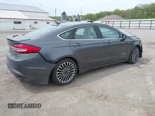 2018 Ford Fusion Titanium with VIN 3FA6P0RU1JR120392, listed as a IAAI auction lot 42145342 with Not provided miles and . Bid and sale history available at DreamBid. Image 4.