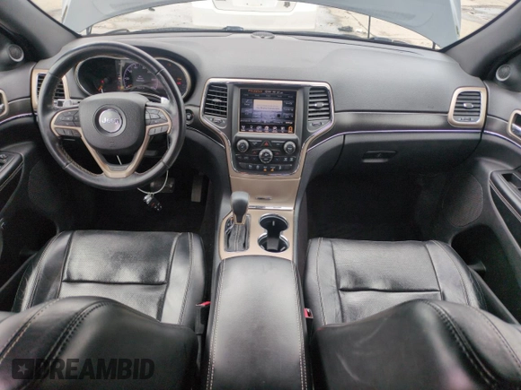 2016 Jeep Grand Cherokee Limited 75th Anniversary with VIN 1C4RJFBG2GC441039, listed as a Copart auction lot 54755875 with 97,242 mi miles and Salvage Title. Bid and sale history available at DreamBid. Image 8.