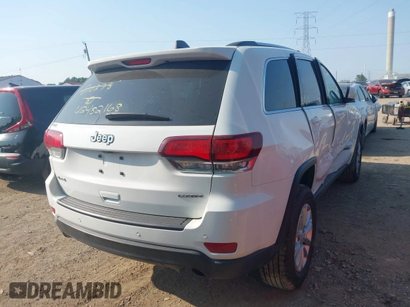 2021 Jeep Grand Cherokee Laredo X with VIN 1C4RJFAG7MC810278, listed as a IAAI auction lot 42482168 with 52,715 mi miles and . Bid and sale history available at DreamBid. Image 4.