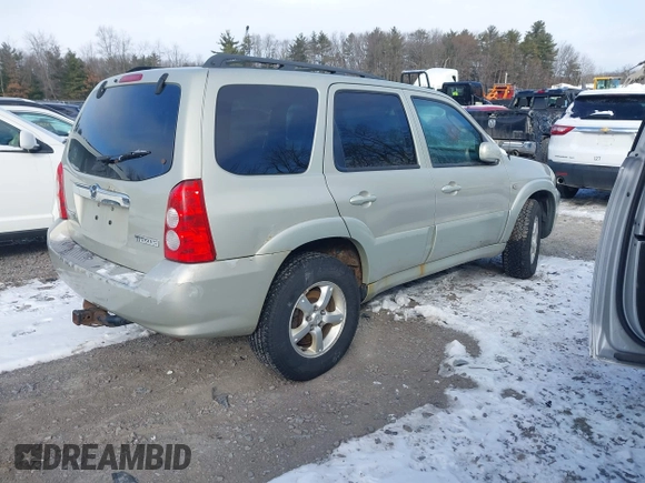 2006 Mazda Tribute LX with VIN 4F2YZ94126KM09467, listed as a IAAI auction lot 41324941 with 116,519 mi miles and . Bid and sale history available at DreamBid. Image 4.
