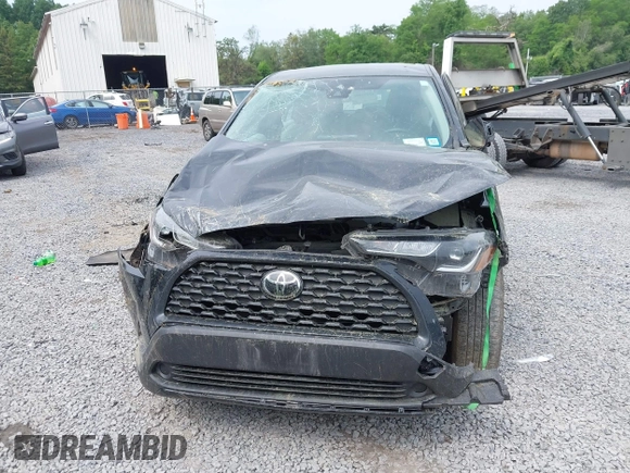 2022 Toyota Corolla Cross L with VIN 7MUAAABG6NV032964, listed as a IAAI auction lot 42458401 with 33,777 mi miles and . Bid and sale history available at DreamBid. Image 12.