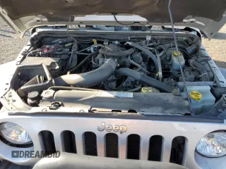 2009 Jeep Wrangler Rubicon with VIN 1J4GA64149L757121, listed as a Copart auction lot 74258934 with 73,241 mi miles and Salvage Title. Bid and sale history available at DreamBid. Image 12.