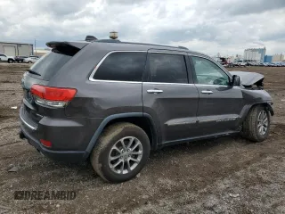 2014 Jeep Grand Cherokee Limited with VIN 1C4RJFBM1EC352484, listed as a Copart auction lot 57983305 with 157,143 mi miles and Salvage title. Bid and sale history available at DreamBid. Image 3.