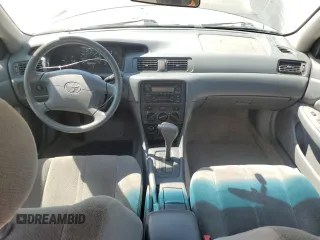 2000 Toyota Camry CE z VIN 4T1BG22K3YU009533, wystawiony jako Copart lot #48996855 z przebiegiem 132 705 mil mil oraz Szkoda całkowita • Salvage title. Historia ofert i sprzedaży dostępna na DreamBid. Obrazek 8.