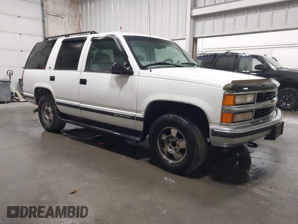 1999 Chevrolet Tahoe Z71 z VIN 1GNEK13R0XJ364222, wystawiony jako IAAI lot #41988710 z przebiegiem 204 577 mil mil oraz . Historia ofert i sprzedaży dostępna na DreamBid. Obrazek 1.