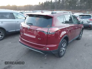 2018 Toyota RAV4 XLE with VIN 2T3WFREV3JW410080, listed as a IAAI auction lot 41329166 with 94,312 mi miles. Bid and sale history available at carsss.com. Image 4.