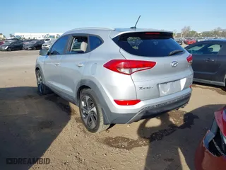 2016 Hyundai Tucson Sport with VIN KM8J33A20GU152145, listed as a IAAI auction lot 41250885 with 117,841 mi miles. Bid and sale history available at carsss.com. Image 3.