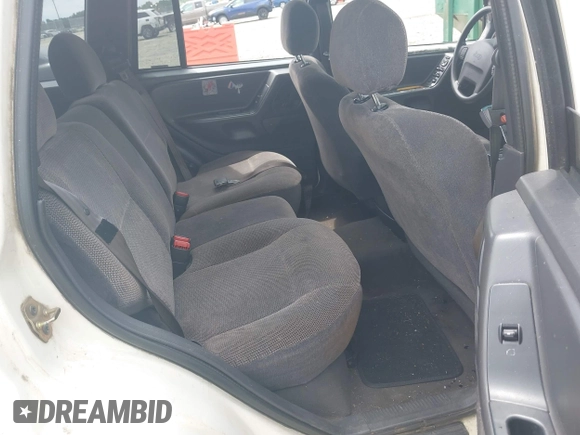 1999 Jeep Grand Cherokee Laredo with VIN 1J4GW58S3XC505985, listed as a IAAI auction lot 42399619 with 253,876 mi miles and . Bid and sale history available at DreamBid. Image 8.