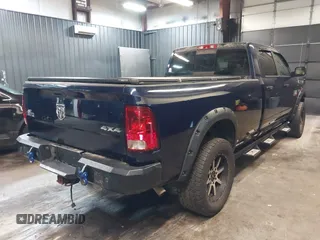 2013 Ram 2500 SLT z VIN 3C6TR5JT1DG566895, wystawiony jako IAAI lot #42096955 z przebiegiem 168 454 mil mil oraz . Historia ofert i sprzedaży dostępna na DreamBid. Obrazek 4.
