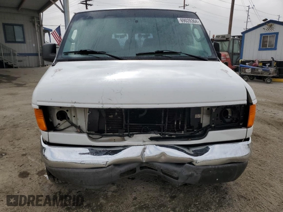 2006 Ford Econoline Passenger XL with VIN 1FMRE11W46DB09883, listed as a Copart auction lot 69028364 with 200,878 mi miles and Salvage Title. Bid and sale history available at DreamBid. Image 5.
