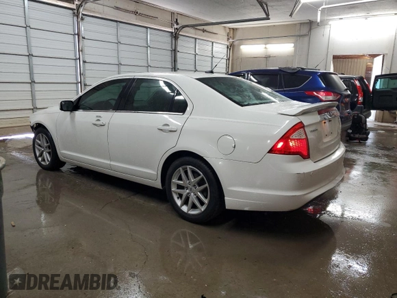 2012 Ford Fusion SEL with VIN 3FAHP0JA7CR330833, listed as a Copart auction lot 52764675 with 182,235 mi miles and Salvage Title. Bid and sale history available at carsss.com. Image 2.