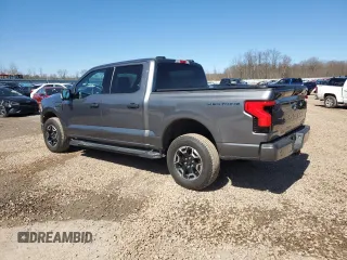 2023 Ford F-150 Lightning Pro with VIN 1FTVW1EL8PWG10894, listed as a Copart auction lot 50988655 with 34,020 mi miles and Salvage Title. Bid and sale history available at DreamBid. Image 2.