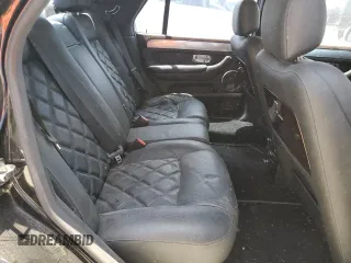 2003 Bentley Arnage z VIN SCBLF34F53CX09475, wystawiony jako Copart lot #57302795 z przebiegiem Nie podano mil oraz Czysty tytuł • Clean title. Historia ofert i sprzedaży dostępna na DreamBid. Obrazek 10.