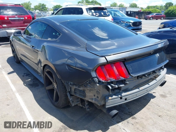 2015 Ford Mustang EcoBoost z VIN 1FA6P8TH5F5351476, wystawiony jako IAAI lot #42157688 z przebiegiem 134 131 mil mil oraz . Historia ofert i sprzedaży dostępna na DreamBid. Obrazek 3.