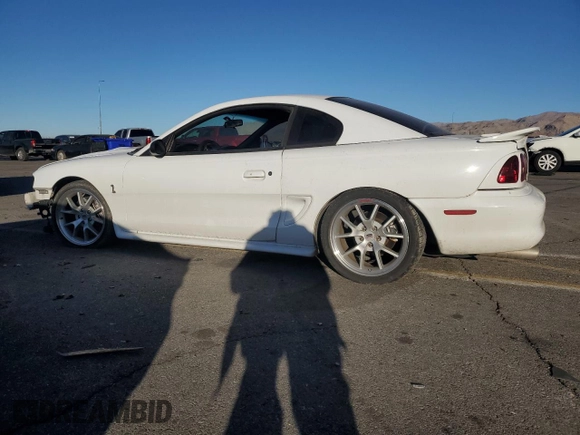 1997 Ford Mustang Cobra with VIN 1FALP47VXVF139807, listed as a Copart auction lot 88045305 with 113,571 mi miles and Salvage Title. Bid and sale history available at carsss.com. Image 2.