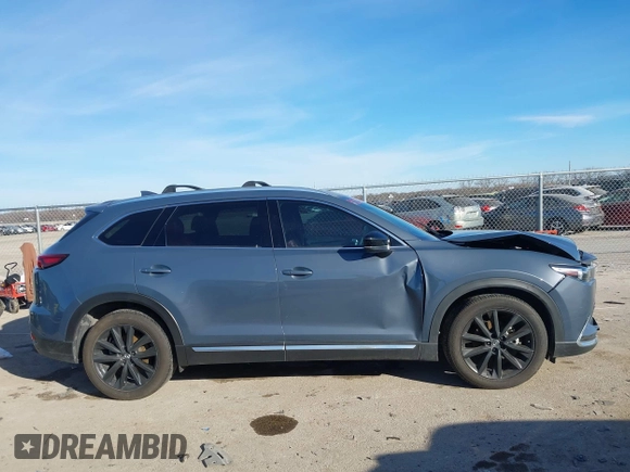 2022 Mazda CX-9 Grand Touring with VIN JM3TCBDYXN0625567, listed as a IAAI auction lot 41327380 with 50,672 mi miles and . Bid and sale history available at DreamBid. Image 12.