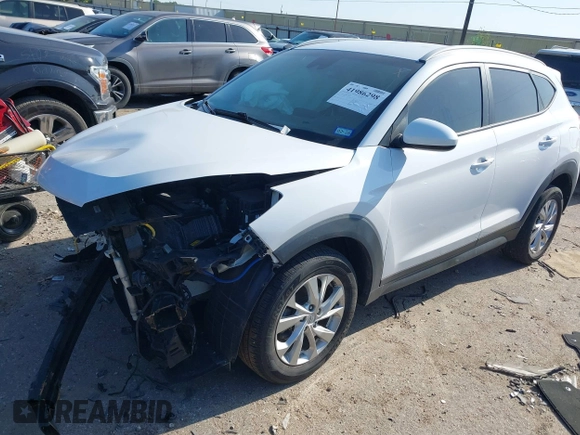 2021 Hyundai Tucson Value with VIN KM8J33A42MU314290, listed as a IAAI auction lot 41986298 with 32,740 mi miles and . Bid and sale history available at DreamBid. Image 18.