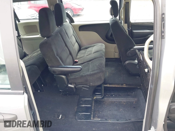 2016 Dodge Grand Caravan SE with VIN 2C4RDGBG5GR251689, listed as a IAAI auction lot 42149865 with 137,410 mi miles and . Bid and sale history available at DreamBid. Image 17.