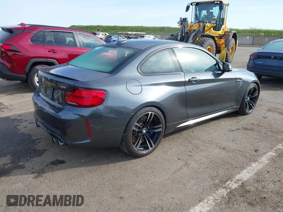 2018 BMW M2 with VIN WBS1J5C50JVE51869, listed as a IAAI auction lot 41814404 with 69,684 mi miles. Bid and sale history available at carsss.com. Image 4.