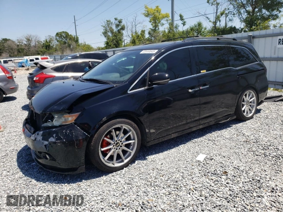 2014 Honda Odyssey Touring with VIN 5FNRL5H97EB016624, listed as a Copart auction lot 53444645 with 244,126 mi miles and Salvage Title. Bid and sale history available at DreamBid. Image 1.
