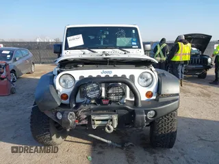 2013 Jeep Wrangler Unlimited Rubicon with VIN 1C4BJWFG0DL529739, listed as a IAAI auction lot 41587047 with 93,116 mi miles. Bid and sale history available at carsss.com. Image 12.