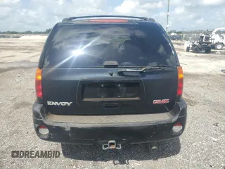 2004 GMC Envoy SLE with VIN 1GKDS13S942114009, listed as a Copart auction lot 67276454 with 178,107 mi miles and Salvage Title. Bid and sale history available at DreamBid. Image 6.