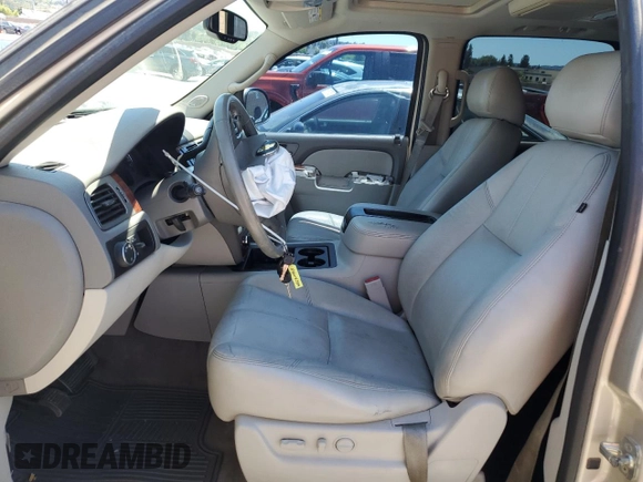 2013 Chevrolet Suburban LT with VIN 1GNSCJE06DR140058, listed as a Copart auction lot 56317995 with 124,345 mi miles and Salvage title. Bid and sale history available at DreamBid. Image 7.