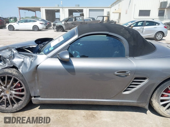 2007 Porsche Boxster S z VIN WP0CB29887U731046, wystawiony jako IAAI lot #42191204 z przebiegiem 153 037 mil mil oraz . Historia ofert i sprzedaży dostępna na DreamBid. Obrazek 14.