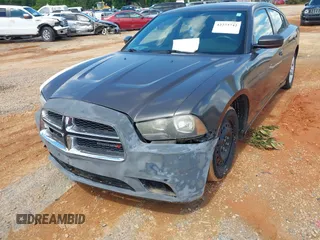 2014 Dodge Charger SE z VIN 2C3CDXBG5EH315467, wystawiony jako IAAI lot #42273742 z przebiegiem 153 493 mil mil oraz . Historia ofert i sprzedaży dostępna na DreamBid. Obrazek 6.