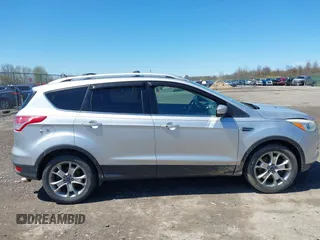 2016 Ford Escape Titanium with VIN 1FMCU9JX6GUB80715, listed as a IAAI auction lot 42060305 with 132,951 mi miles and . Bid and sale history available at DreamBid. Image 13.