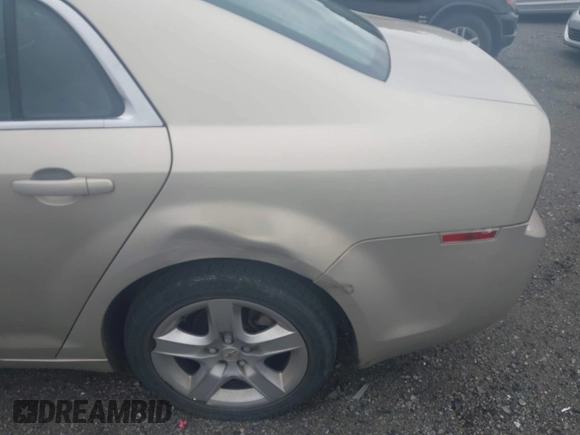 2009 Chevrolet Malibu 1LS with VIN 1G1ZG57B79F260941, listed as a IAAI auction lot 42157902 with 188,112 mi miles and . Bid and sale history available at DreamBid. Image 13.