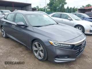 2018 Honda Accord Touring with VIN 1HGCV1F93JA037423, listed as a IAAI auction lot 42751479 with 93,015 mi miles and . Bid and sale history available at DreamBid. Image 1.