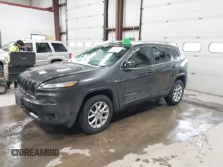 2014 Jeep Cherokee Latitude with VIN 1C4PJMCS0EW213826, listed as a IAAI auction lot 41322537 with 272,659 mi miles and . Bid and sale history available at DreamBid. Image 2.