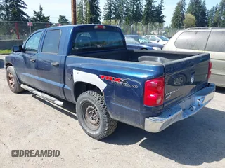 2006 Dodge Dakota SLT with VIN 1D7HW48NX6S708140, listed as a IAAI auction lot 42054527 with 226,944 mi miles and . Bid and sale history available at carsss.com. Image 3.