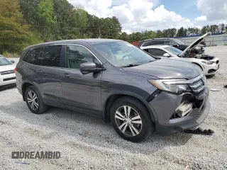 2016 Honda Pilot EX-L with VIN 5FNYF5H76GB035329, listed as a Copart auction lot 51865625 with 126,750 mi miles and Salvage Title. Bid and sale history available at DreamBid. Image 4.