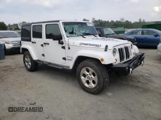 2013 Jeep Wrangler Unlimited Sahara with VIN 1C4HJWEG9DL628684, listed as a Copart auction lot 57672175 with 69,010 mi miles and Salvage title. Bid and sale history available at DreamBid. Image 4.