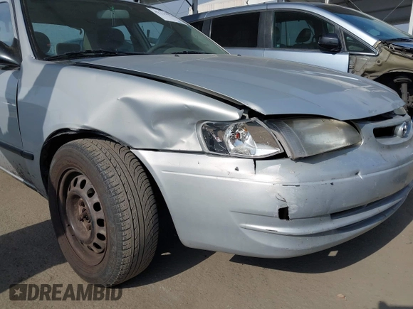 2000 Toyota Corolla VE with VIN 1NXBR12E6YZ393077, listed as a IAAI auction lot 42111914 with 181,056 mi miles and . Bid and sale history available at DreamBid. Image 18.