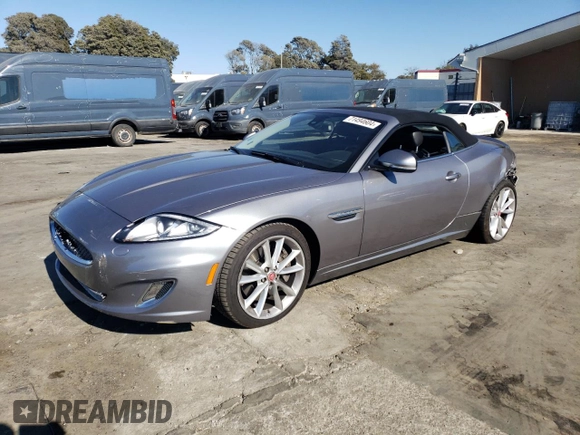 2014 Jaguar XK Touring with VIN SAJWA4EB1ELB54493, listed as a Copart auction lot 71494604 with 73,282 mi miles and Salvage Title. Bid and sale history available at carsss.com. Image 1.