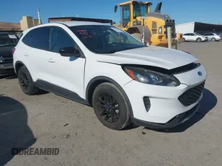 2020 Ford Escape SE Sport Hybrid with VIN 1FMCU0BZ0LUA84259, listed as a IAAI auction lot 42519423 with 70,953 mi miles and . Bid and sale history available at DreamBid. Image 1.