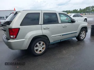 2008 Jeep Grand Cherokee Laredo with VIN 1J8GS48K58C105108, listed as a IAAI auction lot 42068055 with 201,272 mi miles. Bid and sale history available at carsss.com. Image 4.