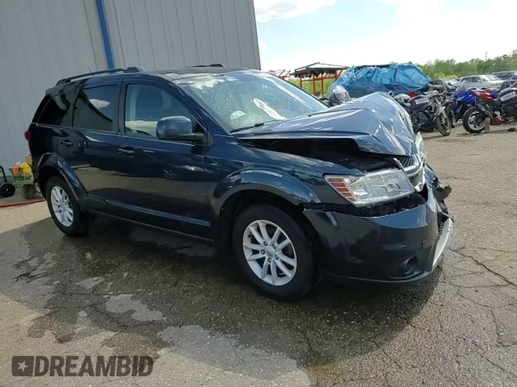 2013 Dodge Journey SXT with VIN 3C4PDCCG1DT637534, listed as a Copart auction lot 56992205 with 128,531 mi miles and Clean title. Bid and sale history available at DreamBid. Image 14.