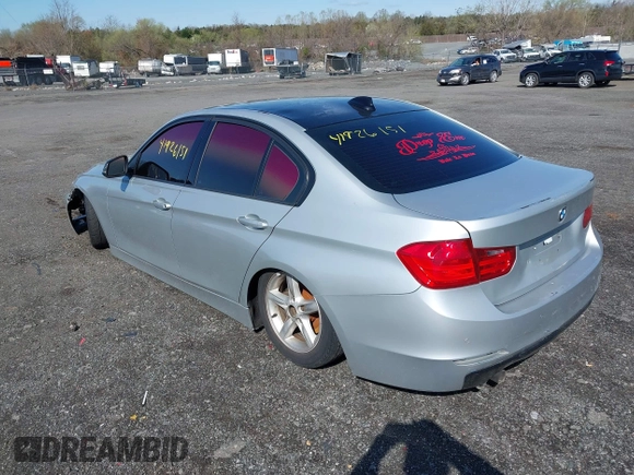 2012 BMW 3 Series 328i with VIN WBA3A5C55CFJ89595, listed as a IAAI auction lot 41926151 with 210,946 mi miles. Bid and sale history available at carsss.com. Image 3.