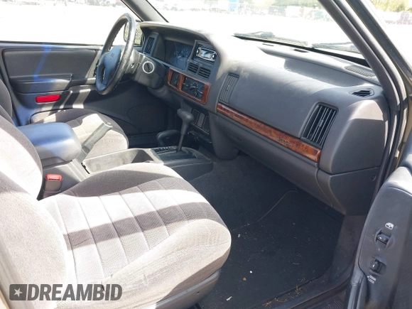 1997 Jeep Grand Cherokee Laredo with VIN 1J4GZ58S5VC500257, listed as a IAAI auction lot 41996034 with 222,513 mi miles and . Bid and sale history available at DreamBid. Image 5.