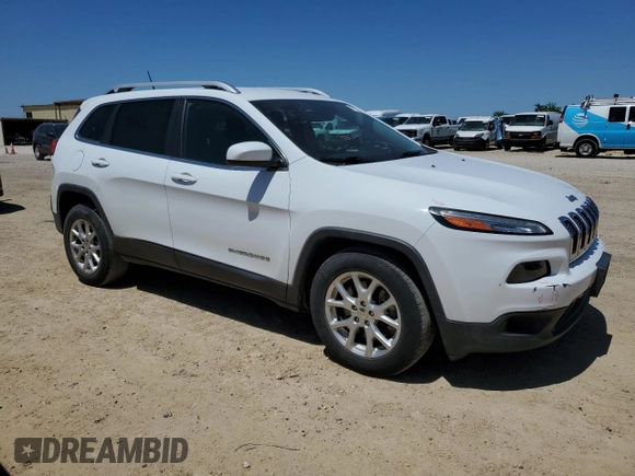 2015 Jeep Cherokee Latitude with VIN 1C4PJLCSXFW643701, listed as a Copart auction lot 51322805 with 67,415 mi miles and Salvage Title. Bid and sale history available at carsss.com. Image 4.