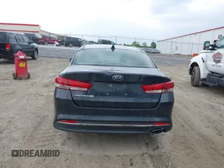 2016 Kia Optima LX with VIN 5XXGT4L38GG023697, listed as a IAAI auction lot 41976461 with 131,023 mi miles. Bid and sale history available at carsss.com. Image 16.