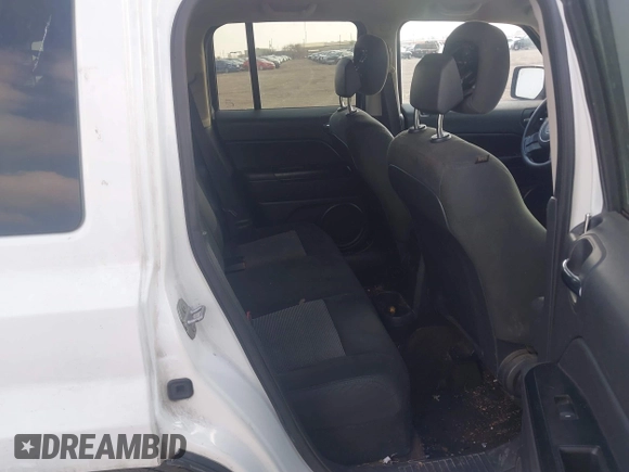 2015 Jeep Patriot Sport with VIN 1C4NJPBB9FD410100, listed as a IAAI auction lot 41536941 with 145,386 mi miles. Bid and sale history available at carsss.com. Image 8.